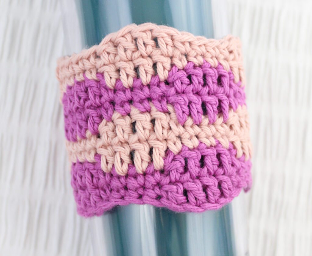 close up of smooth wave crochet stitch cozy on tumbler