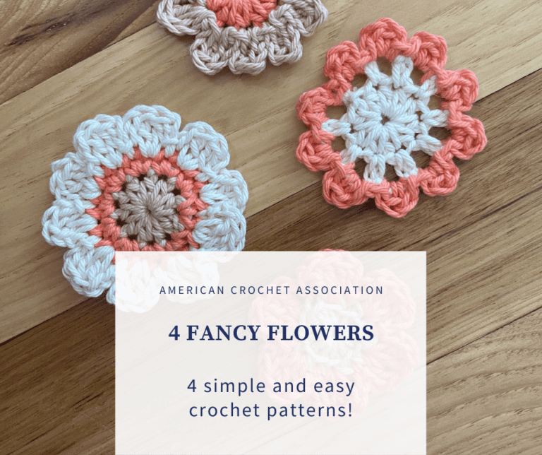 four crochet flowers laying flat