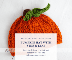 Crochet pumpkin hat with leaf stem and vine