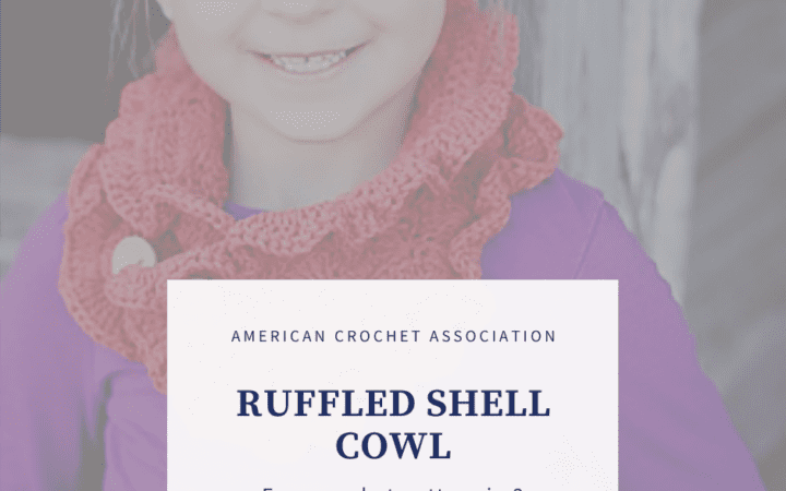 Young girl wearing terracotta crochet shell cowl