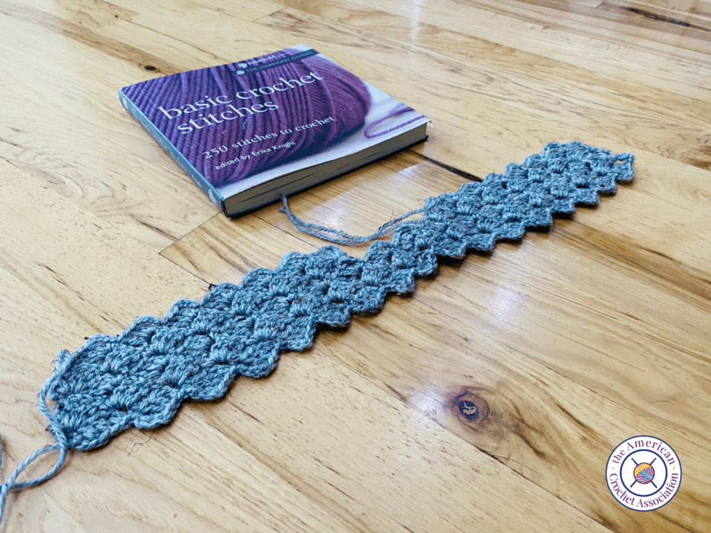 Basic crochet stitches book with crochet swatch